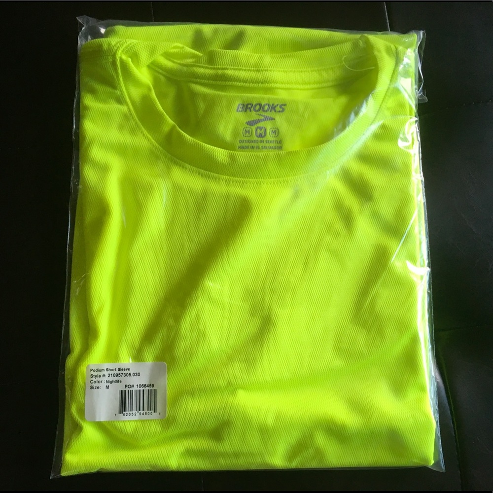 Women’s Short Sleeve dri-fit neon yellow shirt.